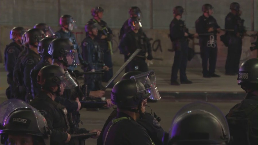 Flash bang, tear gas and arrests as protests continue in Los Angeles